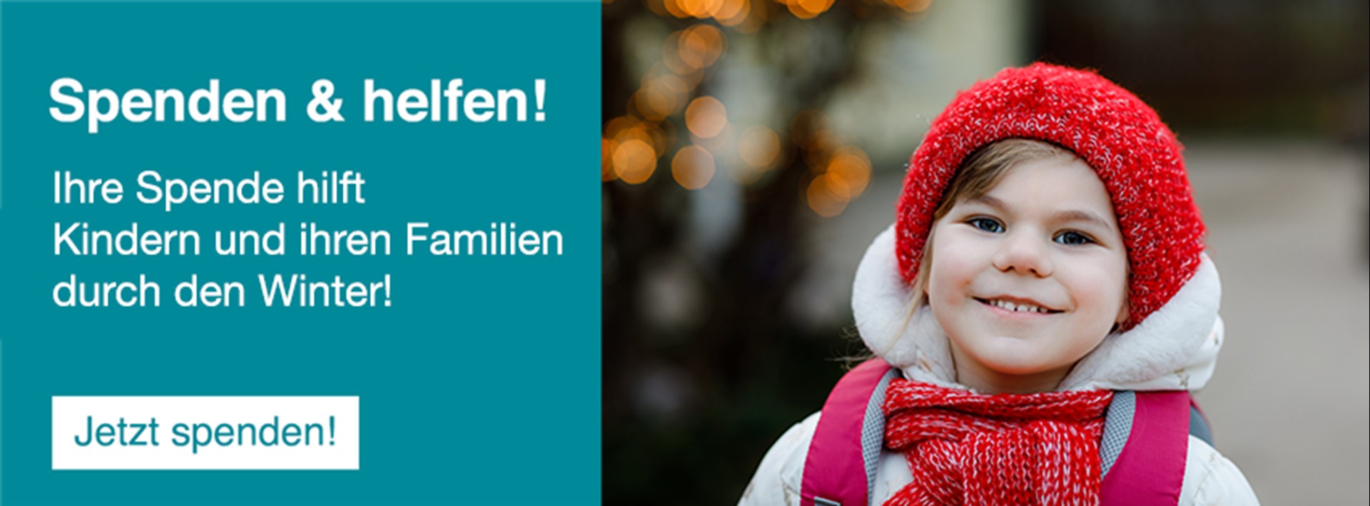 Lächelndes Mädchen mit Mütze, dass dank einer Spende Winterklamotten bekommen hat. 